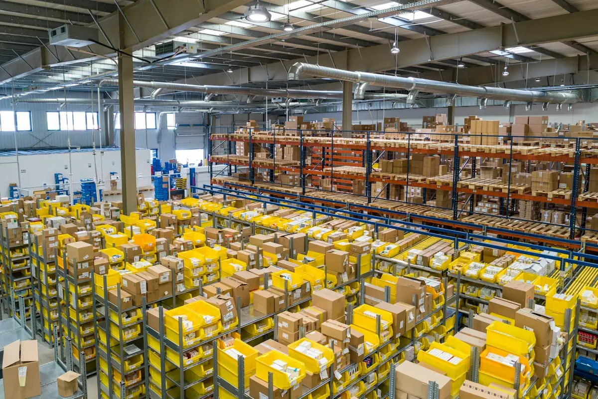 E-commerce fulfillment center with shelving and order totes